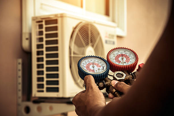 Professional Hvac technician working in Wellesley, MA